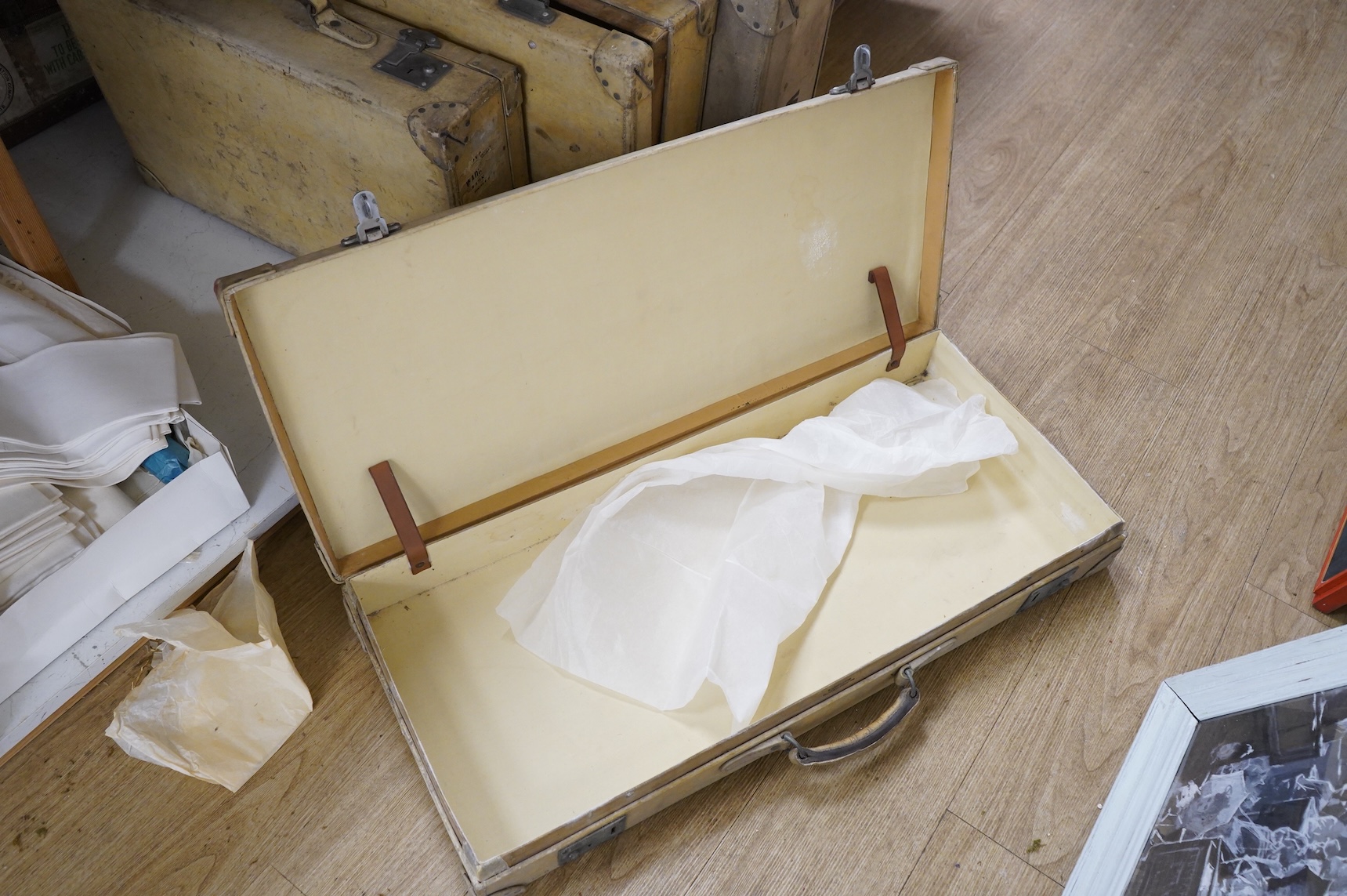 A collection of pig hide vintage luggage comprising six vintage travelling trunks
